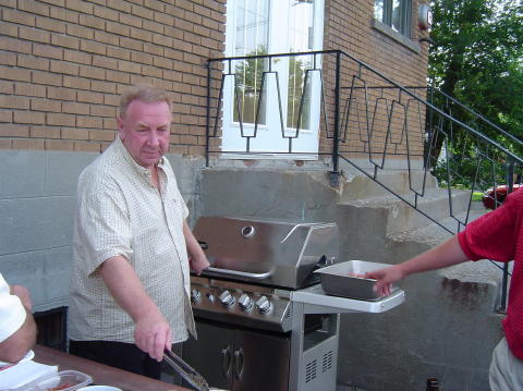 Garold 'whipping' up the hot dogs on his new BBQ
