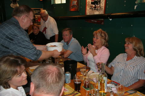 Garold serving 'the big onion soup' to Judy