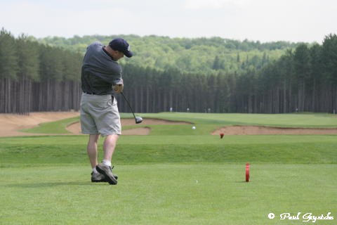 A beauty down the middle - It looks like a 74 coming up