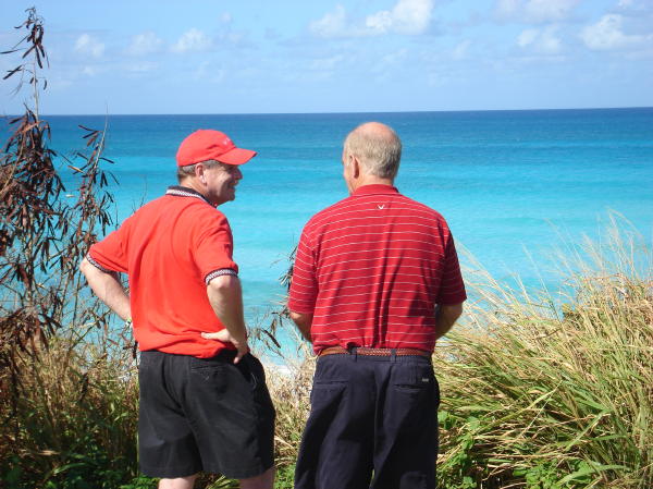 Maurice and Ron discussing possibilities on the 8th tee