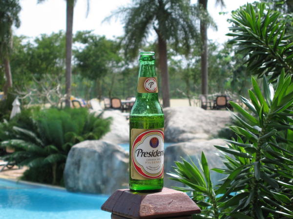 A cold Presidente at the Country Club
