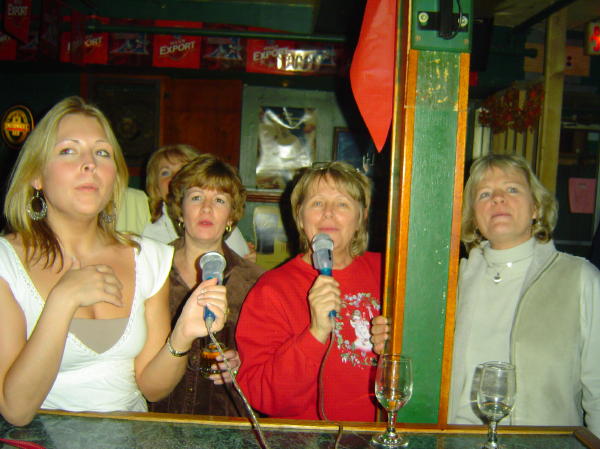 Heather, Judy, Myrna, Casey and Lou looking at the scary lyrics